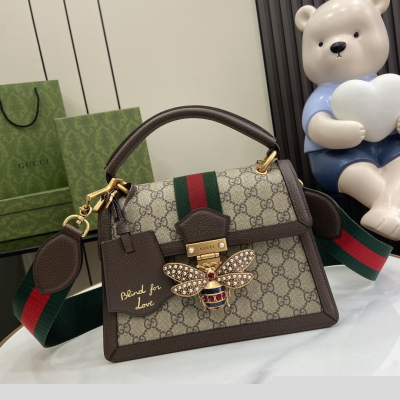 G*u*i top handle bags